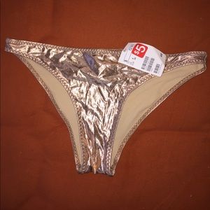 Gold bathing suit bottom size 6