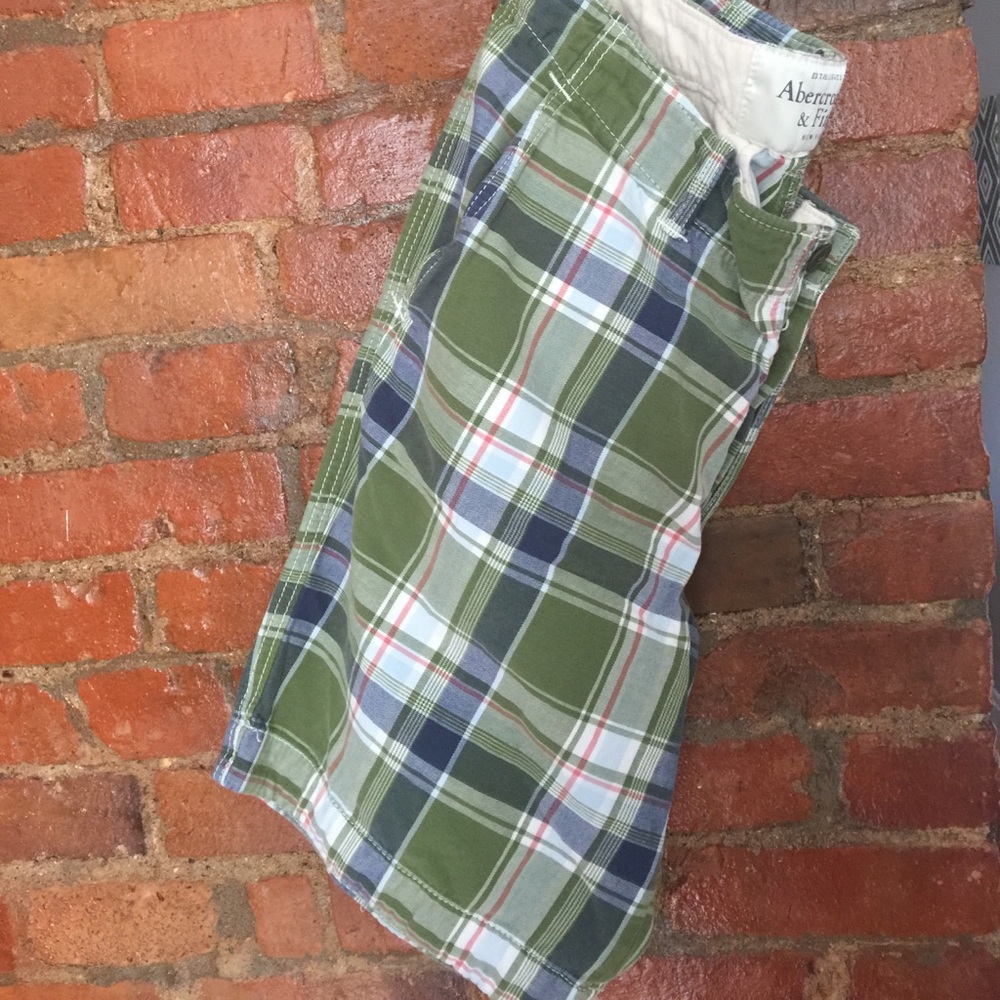 Plaid shorts.