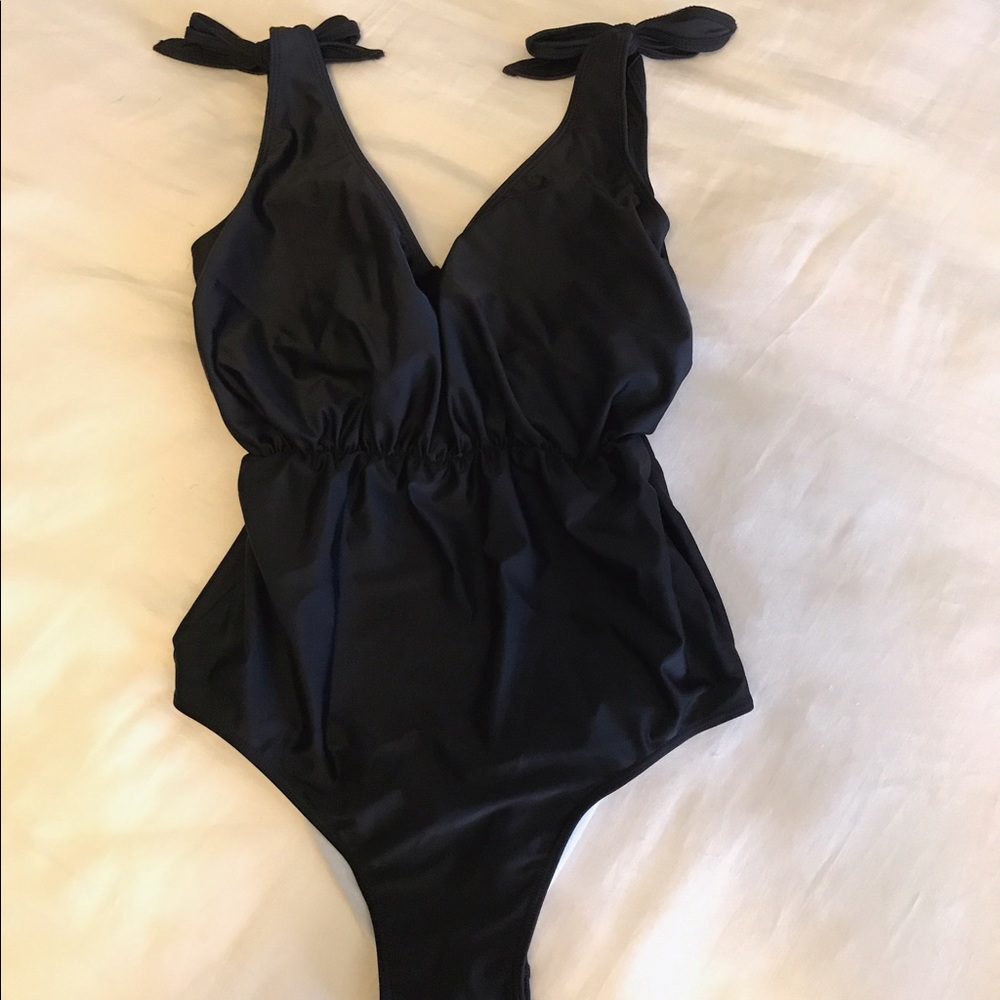 Kortni Jeane black one-piece swimsuit