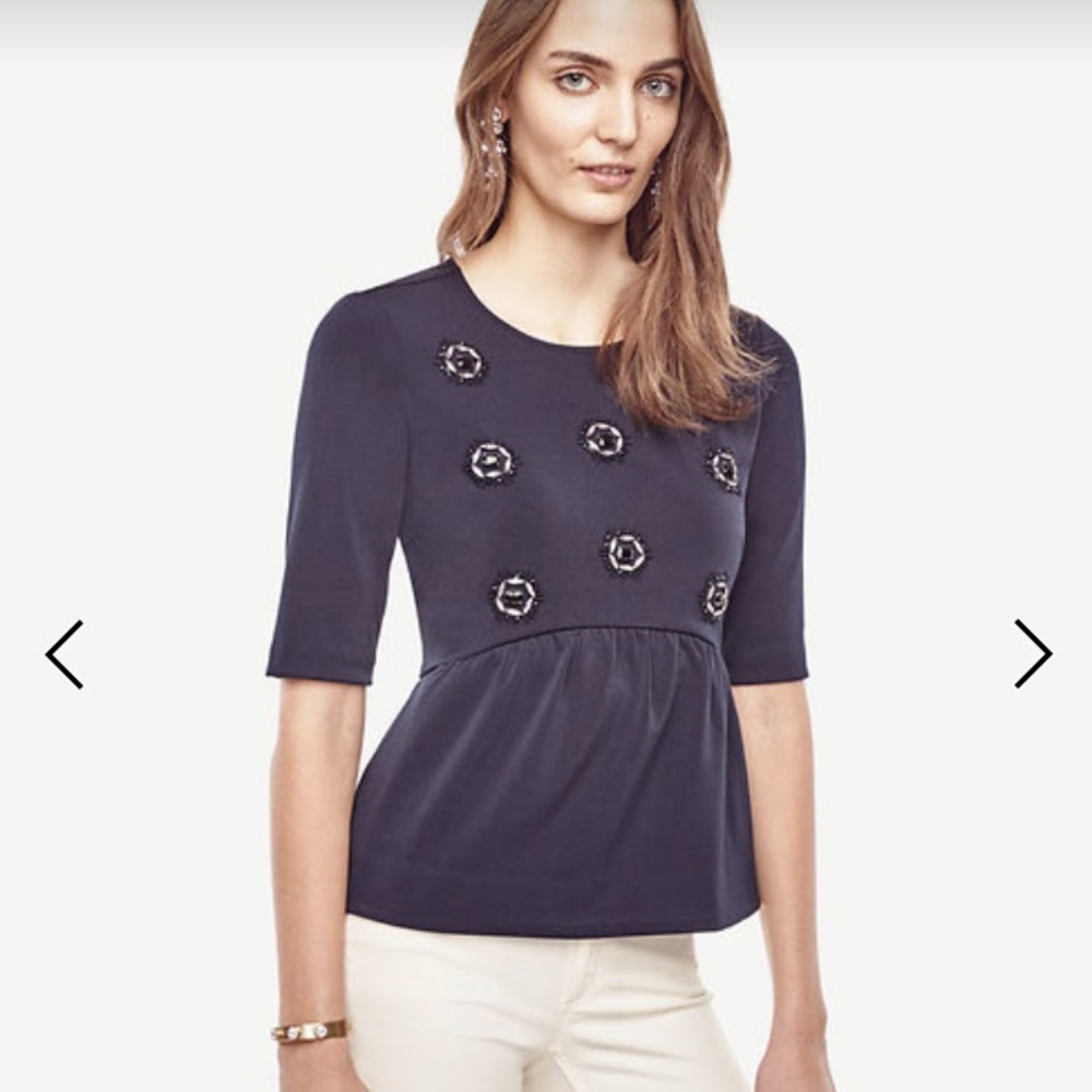Embellished peplum top