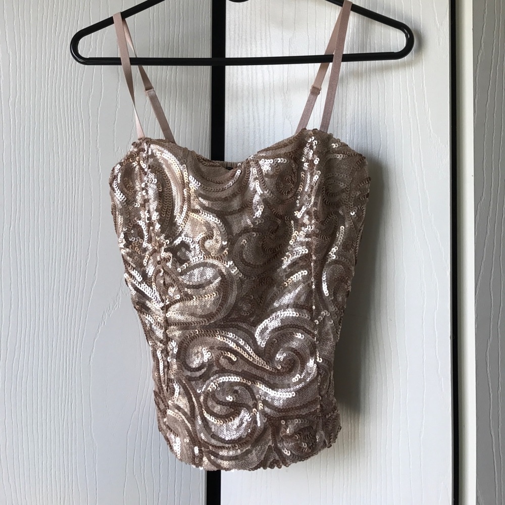 Strapless light gold sequin top.