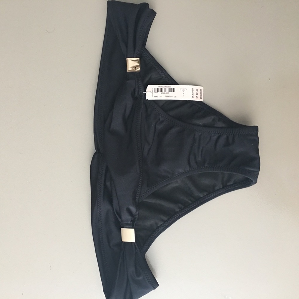 Black cheeky bottoms.