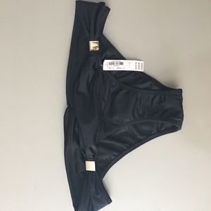 Black cheeky bottoms.