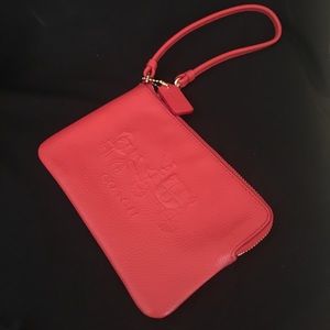 COACH gold & coral wristlet
