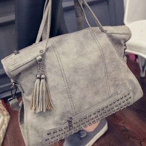 Grey studded purse