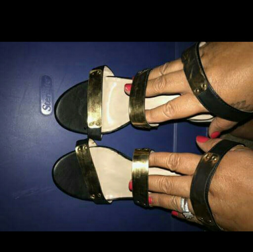 Black and gold heels