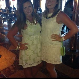 White dress with green slip under