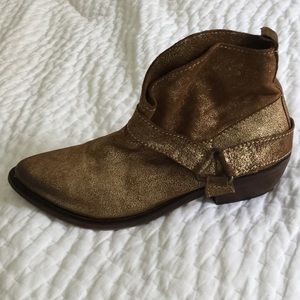 Gold distressed boots