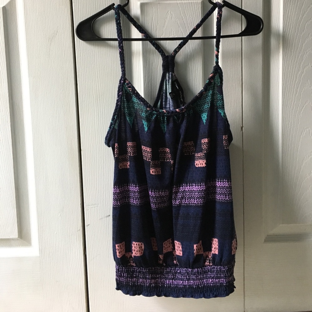 Blue tank top with designs