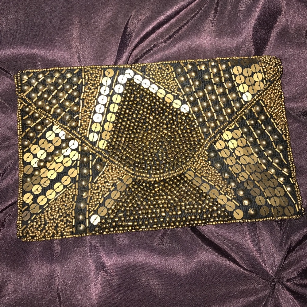 Gold/black sequined clutch