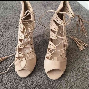 Nude tassel heels