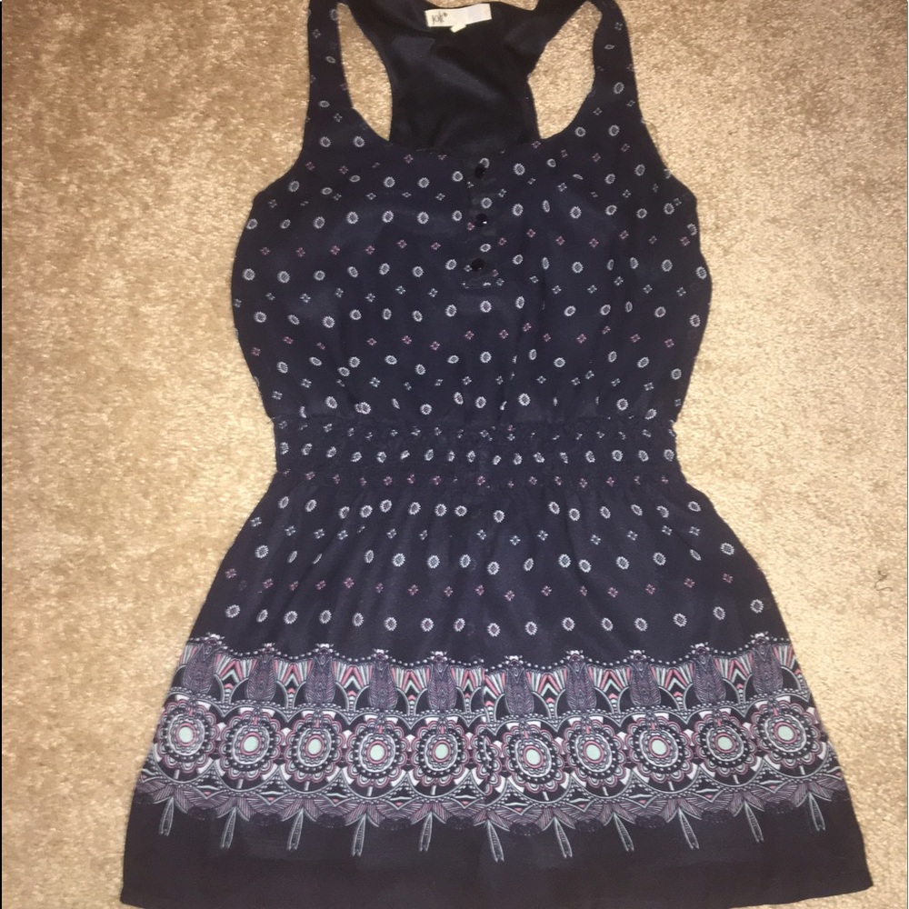 This is a very cute, any time of the year, romper!