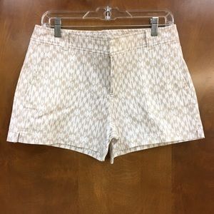 NY & Co. khaki and white printed shorts.