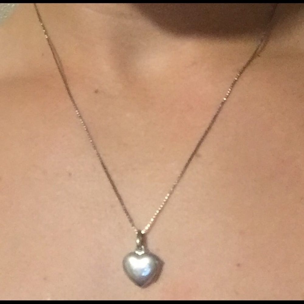 Sterling silver heart shaped locker. 925!