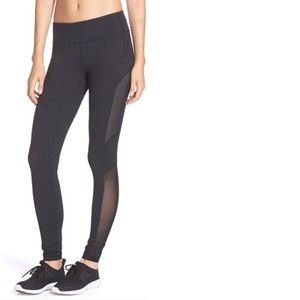 Black fitness pants with cutouts by Zella