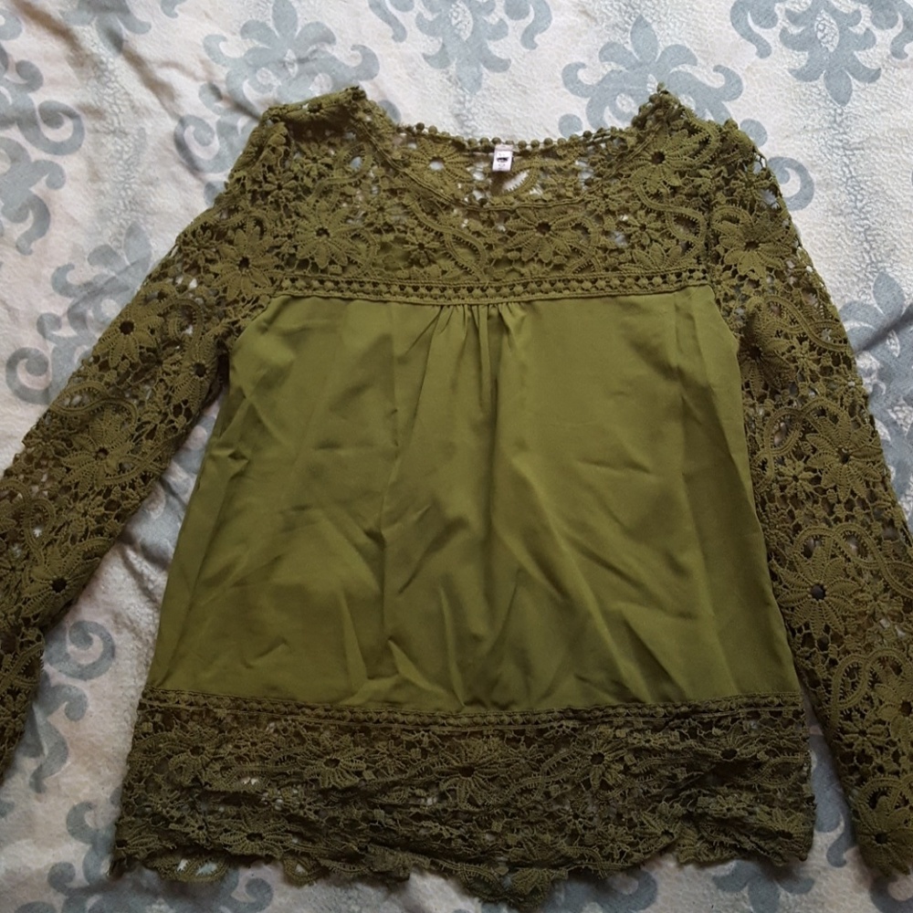 Green lace blouse .