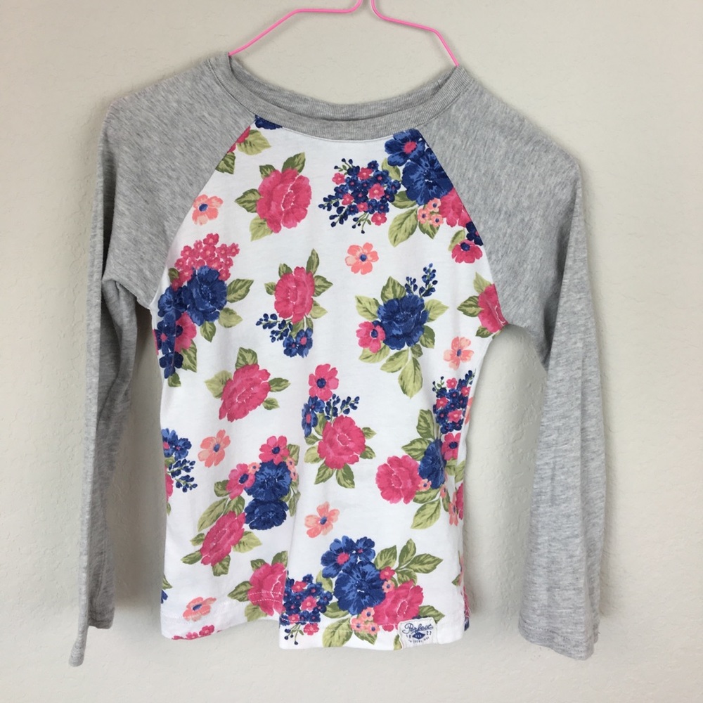 Girls floral top and skinny jeans