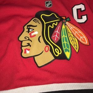 Jhonathan towes Blackhawks jersey