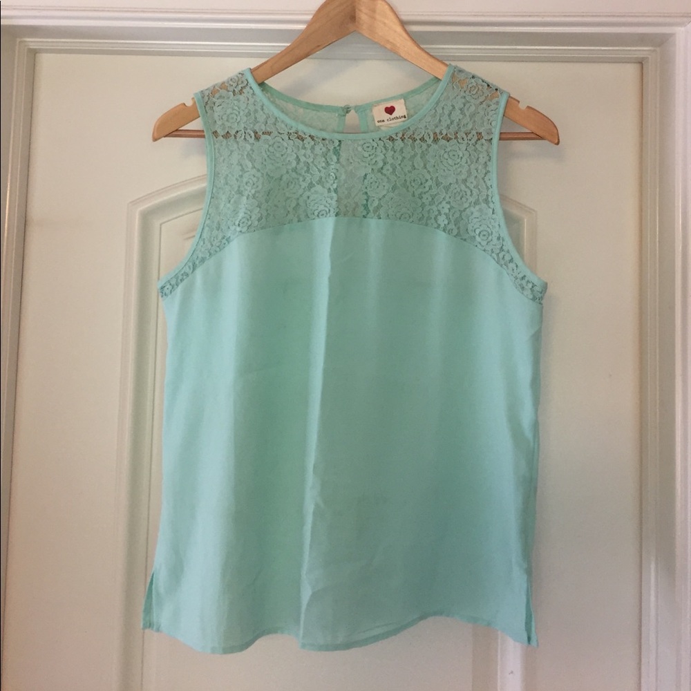 Light blue blouse with details