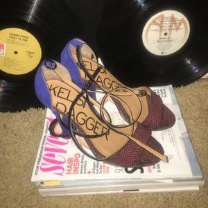 Worn once. Strappy ankles.