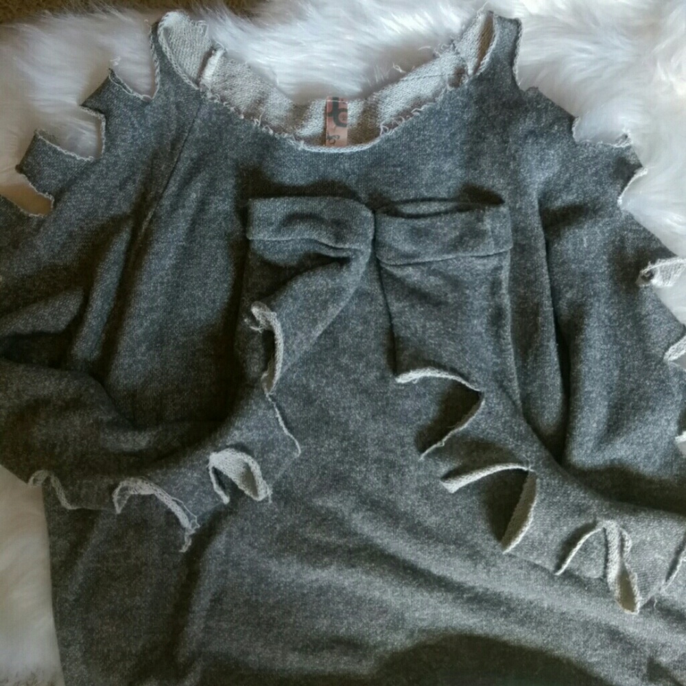 Oversized sweater with cut-up arm detail