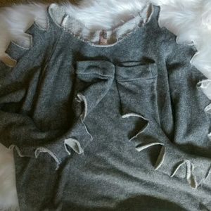 Oversized sweater with cut-up arm detail