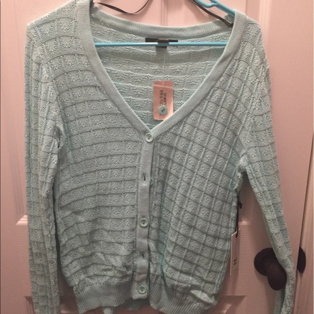 Light green cardigan