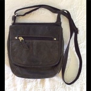 Black FOSSIL leather cross body purse.