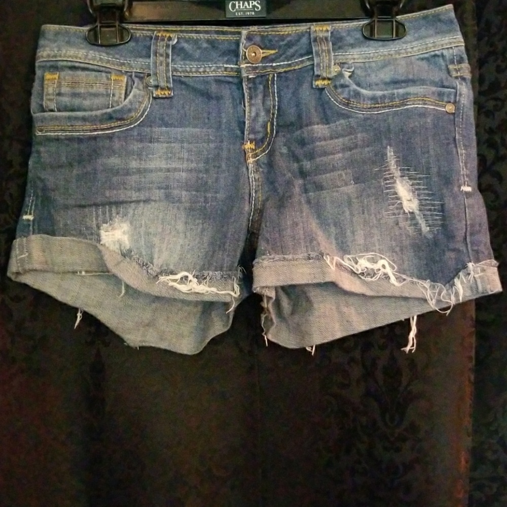 Distressed denim shorts