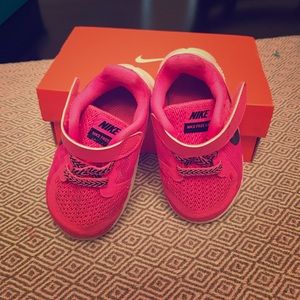 Pink infant Nike shoes size 4