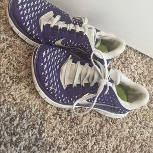 Purple Nike shoes