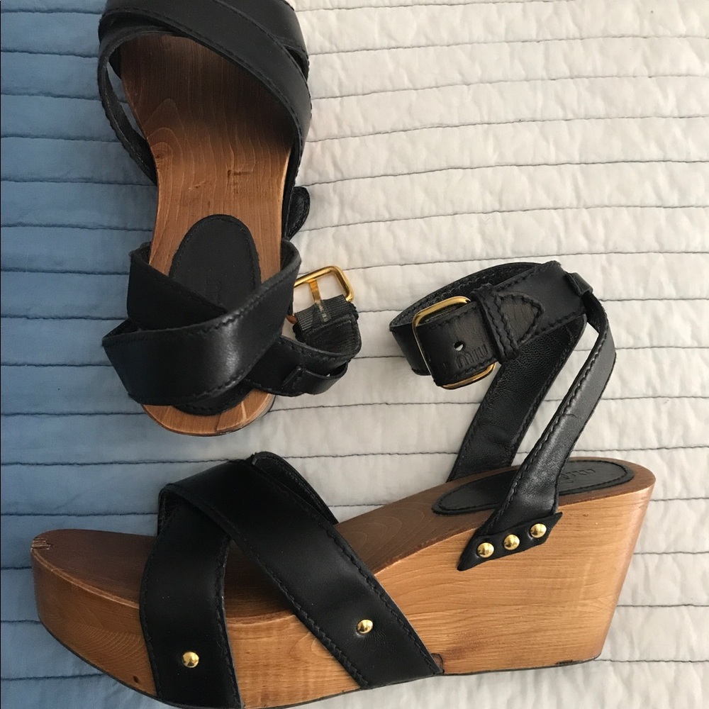 Miu Miu Wood Platform sandals.