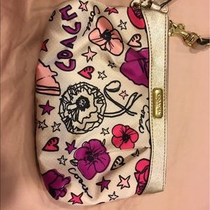 Coach Wristlet with pink and purple flowers