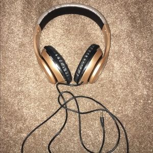 Rose gold head phones with cord // Never Used