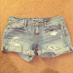 AE distressed midi jean shorts