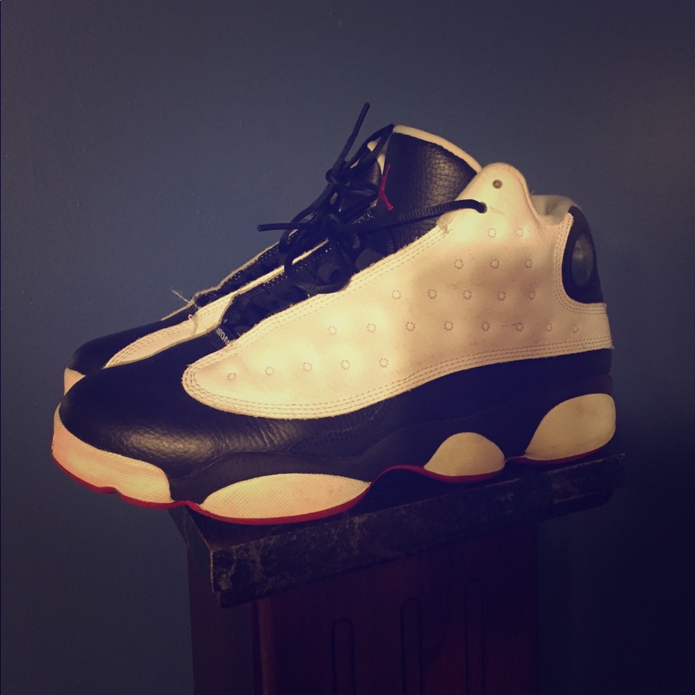 Pair of Jordan 13 shoes