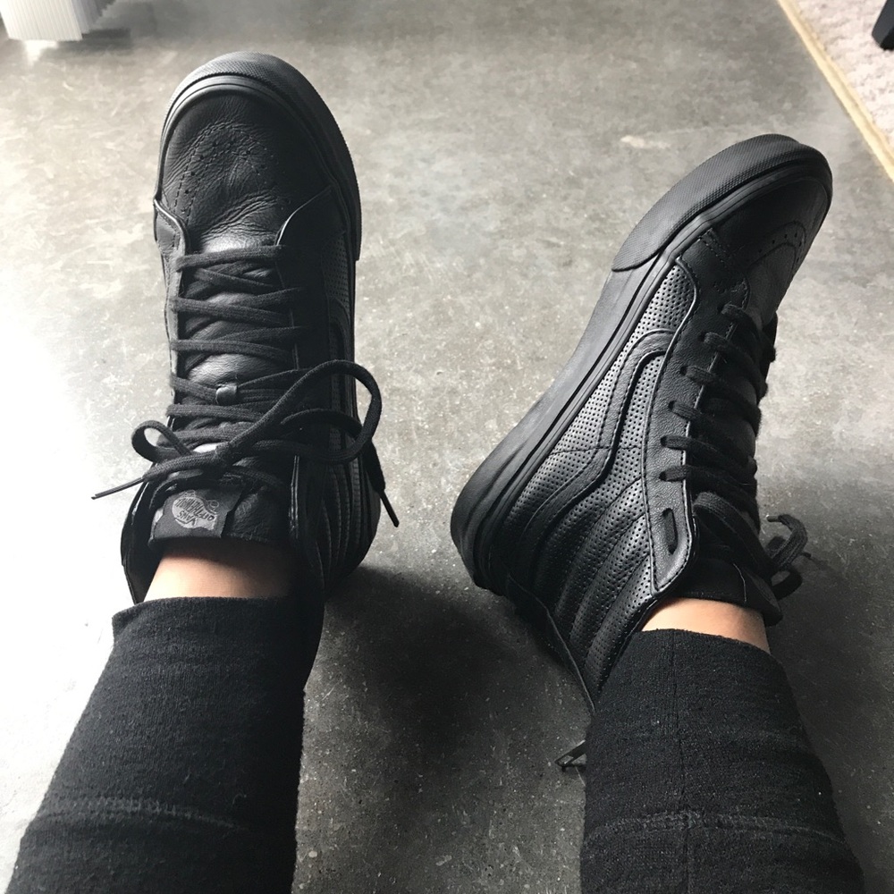 All black leather sk8-Hi Vans