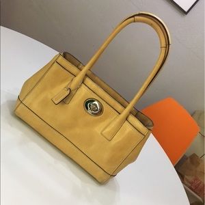 Tanish/yellowish Coach Handbag.