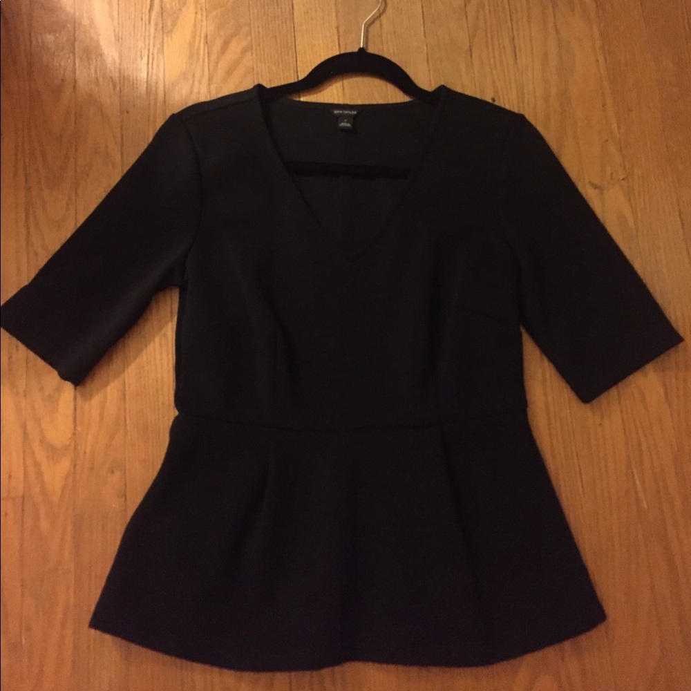 New (once worn) black peplum top