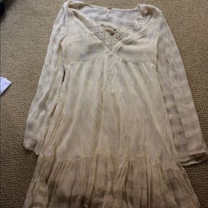 Bell sleeve free people lace dress.