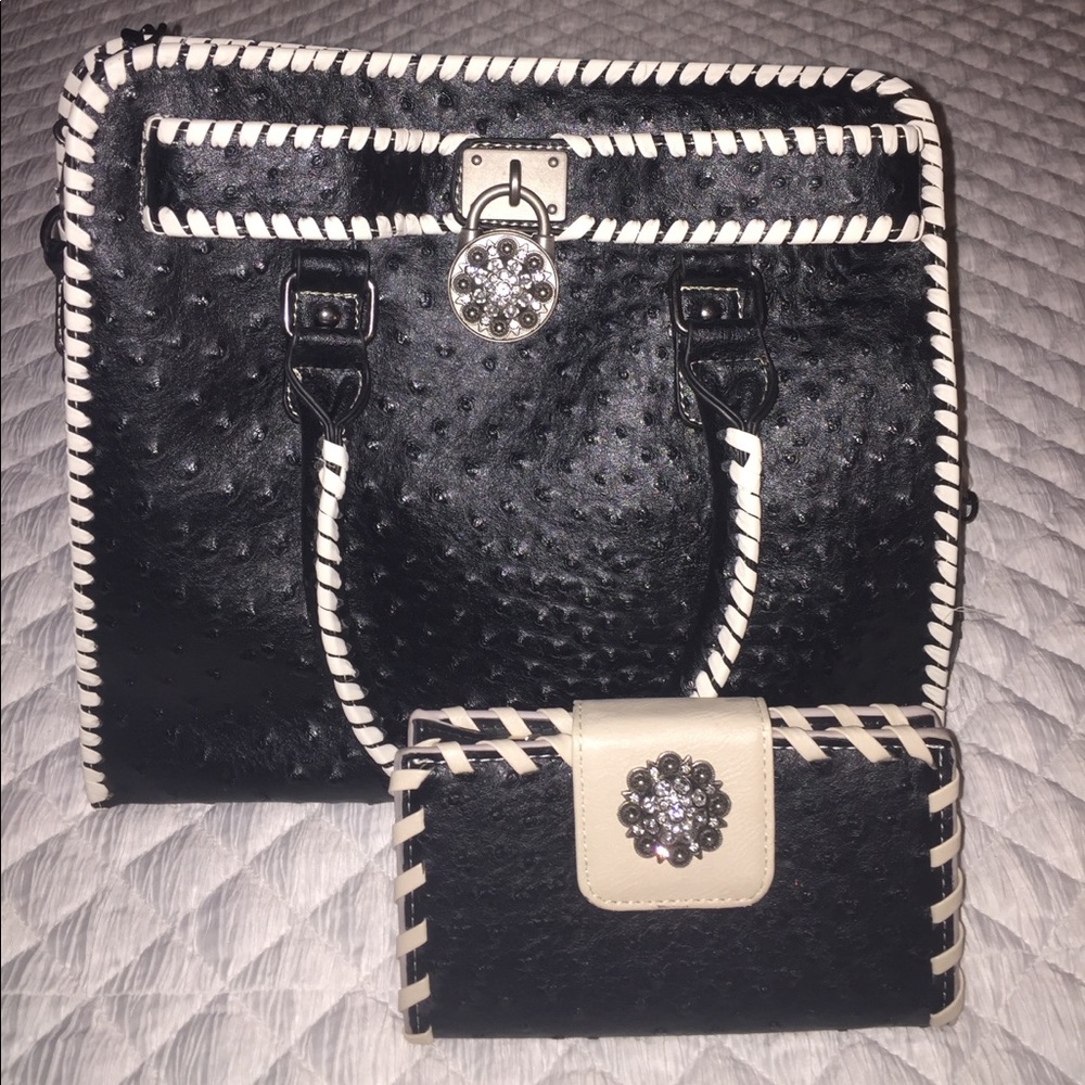 Black and white purse and matching wallet.