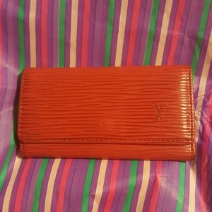 Authentic Louis Vuitton red epi 4 key holder