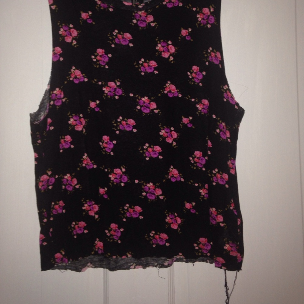 Black cami with floral patterns.