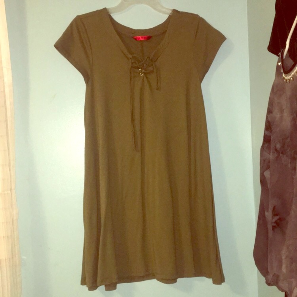 Green tunic style dress with lace up collar