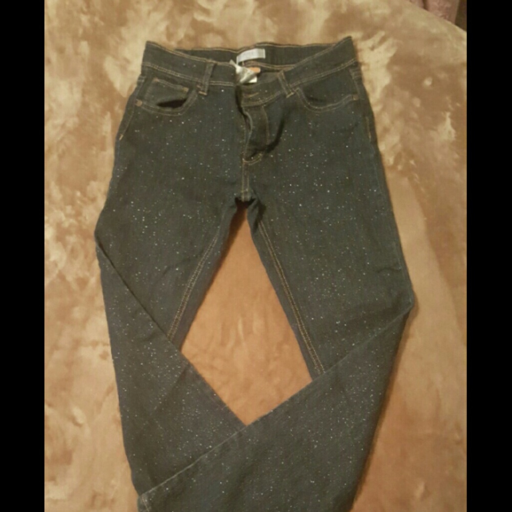 A pair of glitter blue jeans