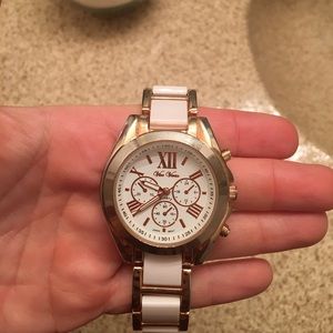 White and gold watch