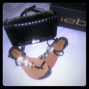 Gold and black Bebe sandals