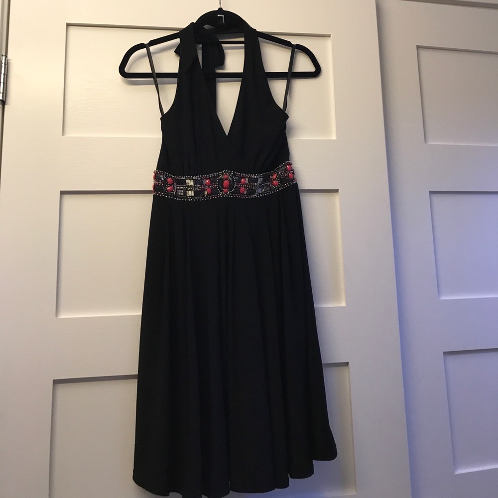 Dress with some flirt, halter neck, beaded waist