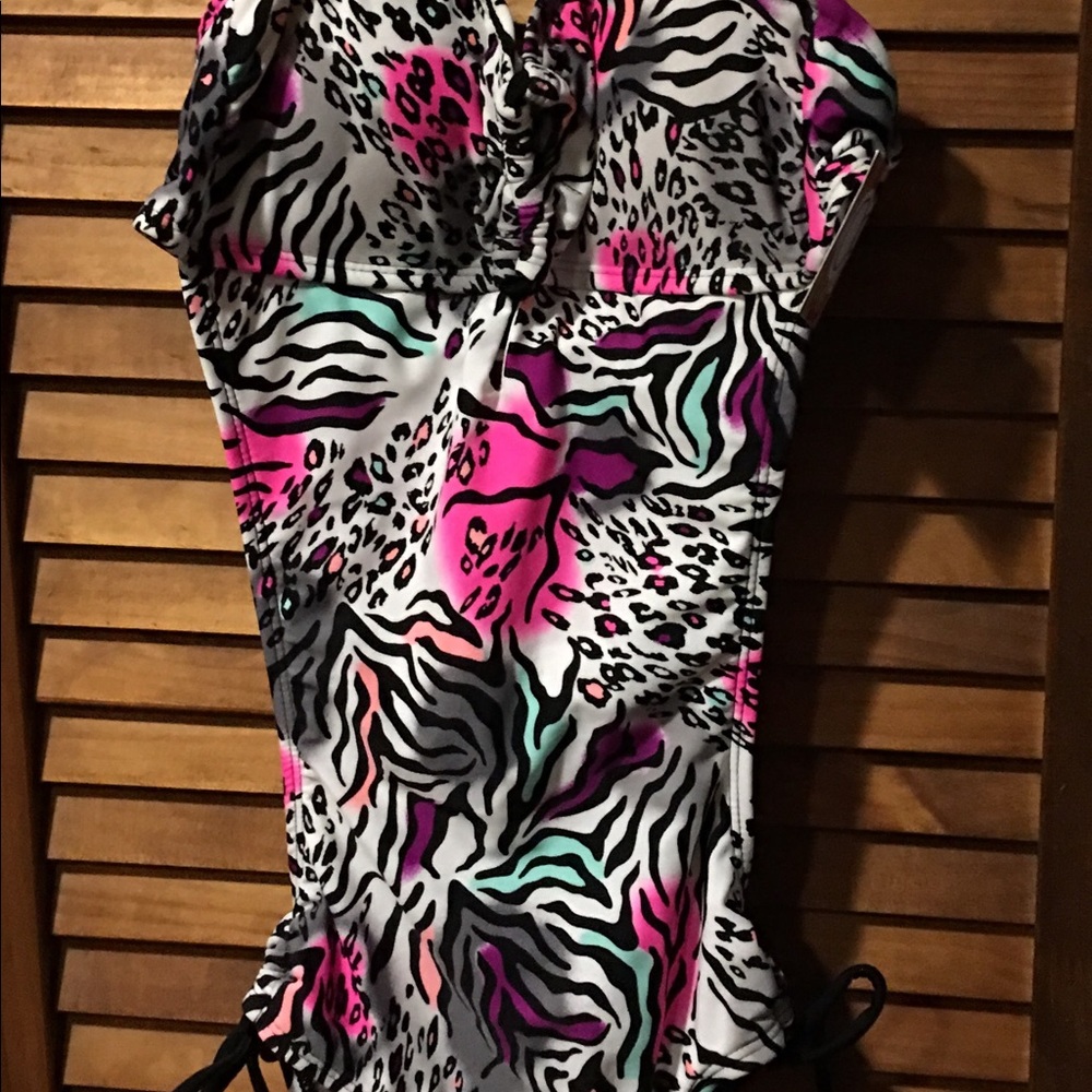 1 piece backless bathing suit.