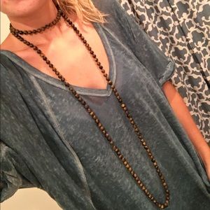 Long brown beaded necklace
